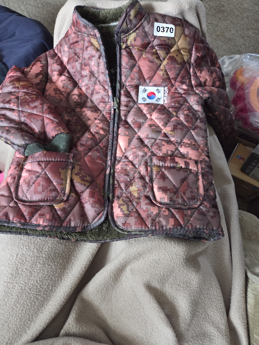 Girls Quilted Pink Camouflage Puffer Jacket.